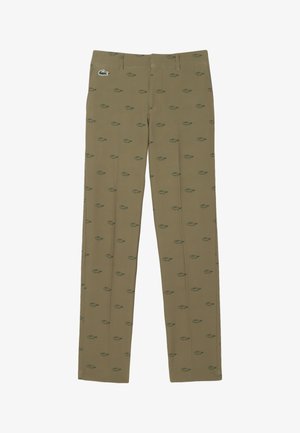 Pantalons kaki avec un motif de crocodile vert sur l'ensemble, coupe droite, texture lisse et taille classique.