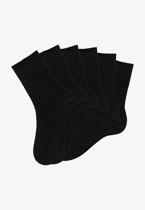 Schwarze Crew-Socken, Set aus sechs Stück. Hergestellt aus glattem Stoff, mit geripptem Bund und verstärktem Zehenbereich. Einheitliches Design, ohne Muster oder Logos.
