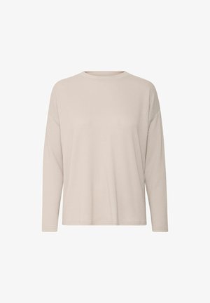 Svetlo béžový dlhý rukáv top s ribovanou textúrou, okrúhlym výstrihom, voľným strihom a rovnomerným lemom s minimalistickým dizajnom.