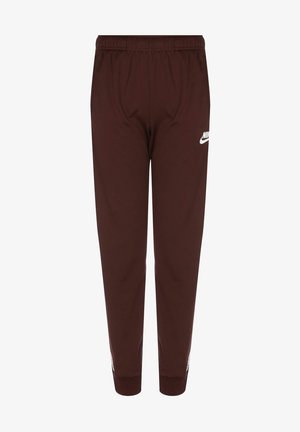 Burgundské tepláky s elastickým pasem, manžetovými nohavicemi a bílým logem Nike na levém stehně. Vyrobeny z měkké a odolné látky.