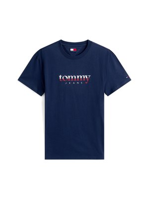 Tengerészkék pamut póló, melyen a "tommy" felirat fehér színben, alatta pedig piros "JEANS" felirat található. Rövid ujjú és kerek nyakkivágású, az ujján logóval.