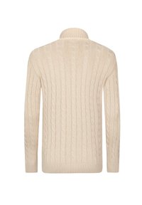 Beige neulepaita korkealla kauluksella, jossa on punoskuvioita sekä resorit hihansuissa ja helmassa. Pehmeä koostumus, sopii rentoon pukeutumiseen.