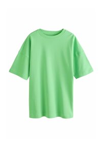 Groene katoenen T-shirt, ontspannen pasvorm, korte mouwen, ronde hals, gladde textuur, geen zichtbare patronen of hardware.