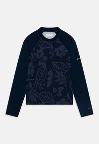 Jūras spēku garām piedurknēm krekls ar tonālu ziedu rakstu, raglan piedurknēm, apaļu dekoltē un Columbia logo kreisajā piedurknē.