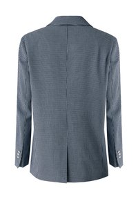 Kostymjacka i houndstooth-mönster i marinblått och vitt, med slagkrage, långa ärmar och knappdekorationer på ärmsluten. Detalj med slits bak.