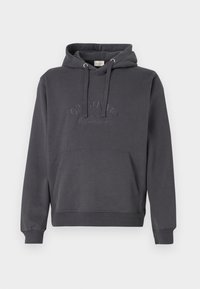 Sudadera de algodón gris con un bolsillo frontal tipo canguro, cordones y el logotipo bordado "ORIGINALS" en el pecho. Cuenta con puños y dobladillo acanalados.