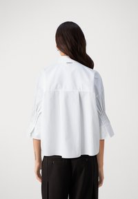 HUGO ETJE - Button-down blouse - white