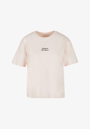 Tricou din bumbac roz deschis, cu mâneci scurte, guler rotund și text negru care spune "Sunlover Starchaser" în centrul frontal.