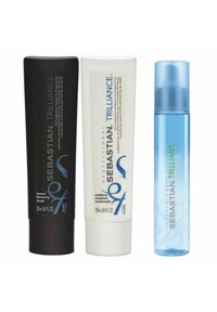 Three hair care products: black shampoo tube, white conditioner tube, and a blue spray bottle, each with clear labeling and distinct shapes.