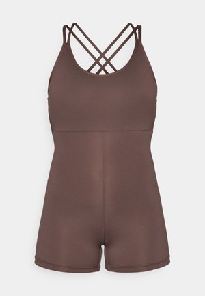 Body sportiv maro cu un design ajustat, textură moale, bretele late și detalii cu spate încrucișat. Lungime scurtă a picioarelor.
