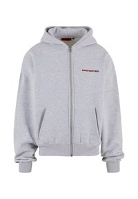 Hoodie gris zippé en tissu doux, avec une poche frontale et le texte rouge "INTERDIT" sur le côté gauche de la poitrine.