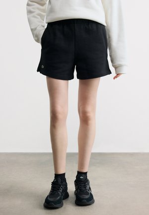 - Spodnie treningowe