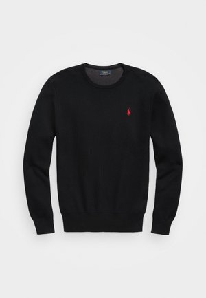 Stickad tröja - black