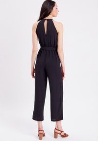 Cache Cache MIT GÜRTEL - Jumpsuit - noir