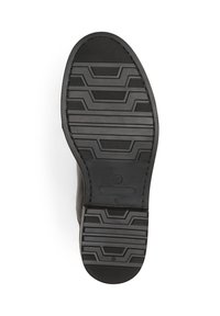 Suola in gomma nera di una scarpa elegante con battistrada a motivo geometrico e taglia 37 contrassegnata vicino all'area dell'arco.