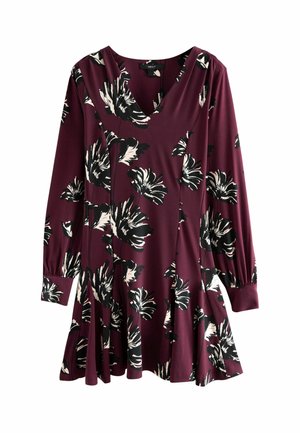 Burgundia mekko, jossa on V-pääntie ja pitkät hihat, musta-valkoisella kukkapainatuksella. Valmistettu pehmeästä kankaasta, jossa on liehuva helma.