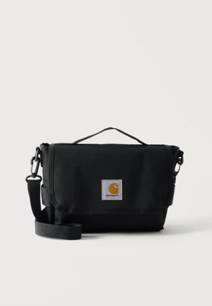 Zwarte Carhartt schoudertas met verstelbare band, bovenhandvat en voorflap met het gele merklogo.