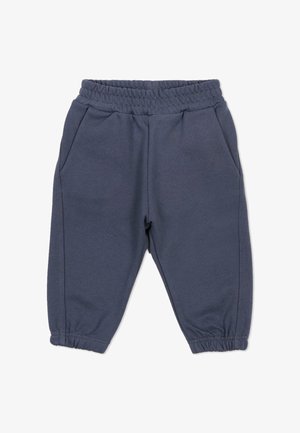 Ciemnoniebieskie, elastyczne spodnie dresowe dla malucha z ściągaczami przy kostkach i kieszeniami po bokach, wykonane z miękkiego materiału.