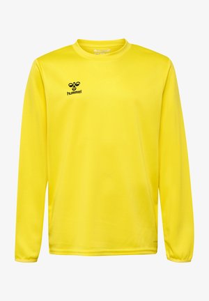 Maillot de sport jaune à manches longues en tissu lisse, avec un col rond et un logo "hummel" noir sur la poitrine.