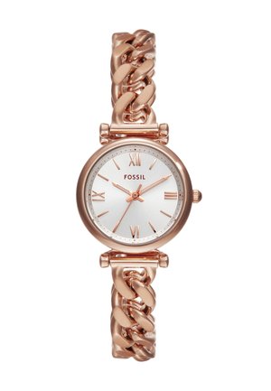 Montre en métal rose doré avec un bracelet à maillons épais. Le cadran blanc rond est orné d'index horaires en rose doré et du logo de la marque. Design simple et élégant.
