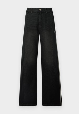 Videben svarte jeans med kontrasterende svarte sidepaneler, laget av denim og med en sølvmetallknapp og subtil logo-detalj.