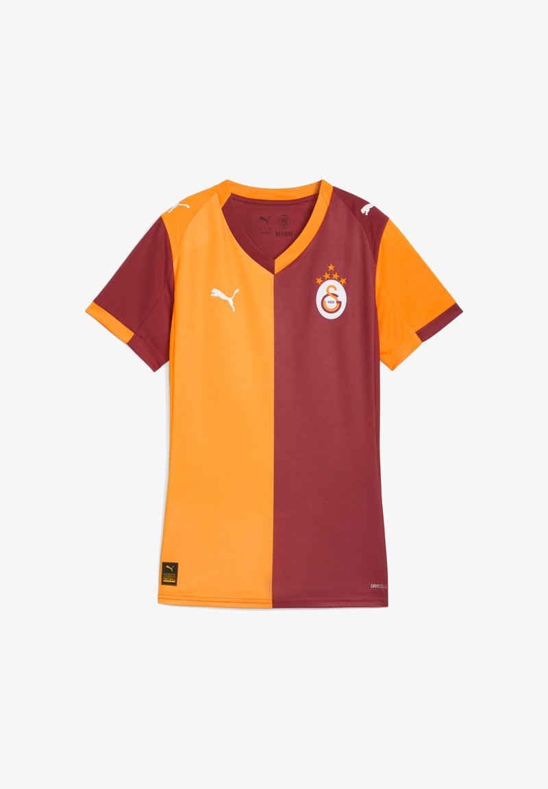 Maglia da calcio marrone e arancione con scollo a V, maniche corte e logo sul petto. Realizzata in materiale leggero con un design a doppio strato.