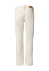 Μπεζ τζιν με ίσια γραμμή που φαίνεται από πίσω, με δύο πίσω τσέπες και καφέ δερμάτινη ετικέτα μάρκας στη μέση.