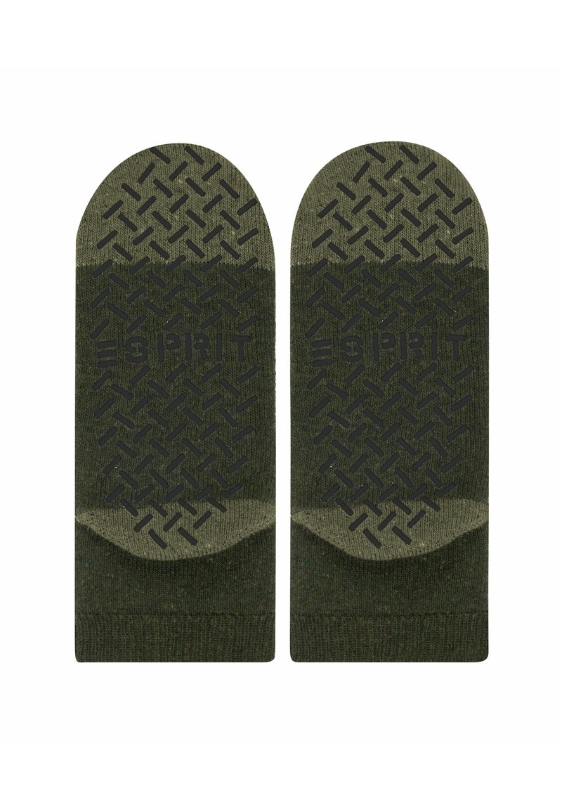Grüne Socken mit einem strukturierten Griffmuster an der Sohle, das einen glatten oberen Bereich und ein Logo-Detail in der Mitte aufweist.