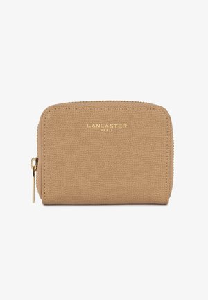 Beige leather wallet with a textured surface, zip closure, and gold "Lancaster Paris" logo embossed on the front. Small size, rectangular shape.