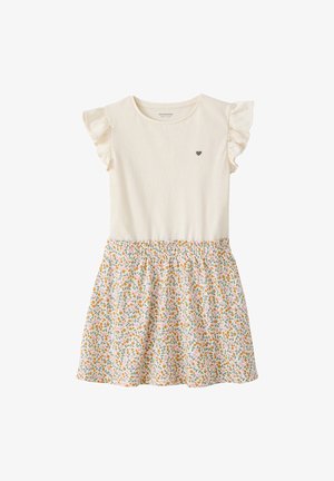 Cremefarbenes Kurzarmkleid mit Rüschenärmeln, kleinem Herzdruck auf der Brust und floral gemustertem Rock mit orange, pink und grünen Akzenten.