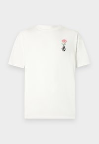 T-shirt en coton blanc à manches courtes. Présente une rose rose et un motif géométrique noir brodé sur la poitrine gauche.