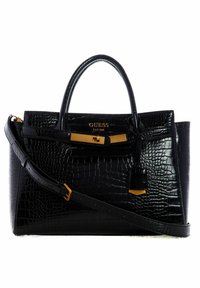 Zwarte neplederen handtas met een krokodillenstructuur, goudkleurige hardware, handvatten aan de bovenkant en een afneembare schouderriem. Voorzien van een hangslot bedel.
