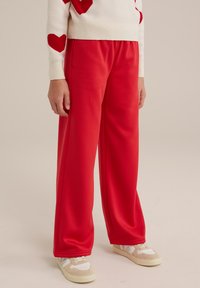 WE Fashion Auduma bikses - red