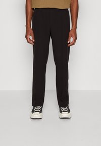 Weekday Kalhoty - black