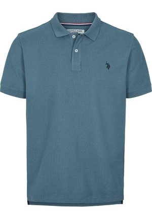 Koszulka polo w miękkiej, niebieskiej bawełnie z teksturowanym wykończeniem, z kołnierzykiem na dwa guziki i małym ciemnym logo na lewej piersi.