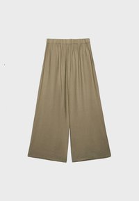 Pantalon beige à jambes larges et taille haute avec une ceinture élastique, fabriqué en tissu léger, posé à plat sur un fond neutre.