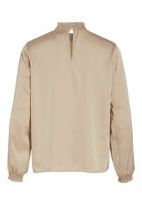 Blouse beige à manches longues avec col haut smocké, ouverture goutte d'eau dans le dos avec fermeture par bouton et poignets smockés.