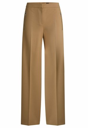 Tan wide-leg trousers with a flat front, dual zippered pockets, and smooth fabric texture. Features clean lines and a tailored silhouette.
