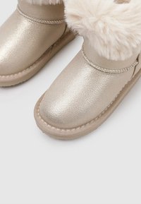 Osito by Conguitos Zapatos de bebé - gold