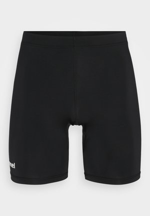 Melnas sporta šortas no gluda, elastīga materiāla ar piegulošu dizainu un baltu logo kreisajā augšstilbā.