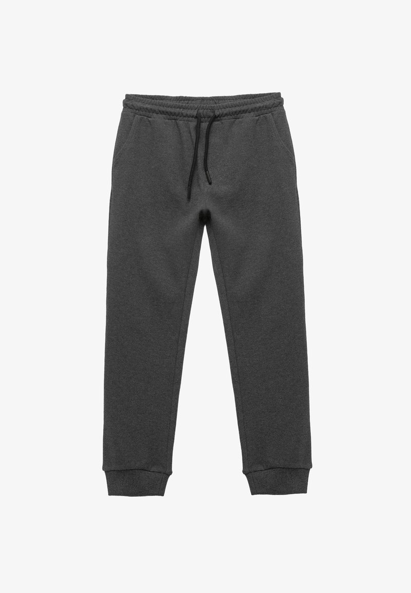 Szare dresy wykonane z miękkiego materiału, z elastycznym pasem w talii i regulowanym sznurkiem, bocznymi kieszeniami oraz ściągaczami przy nogawkach.