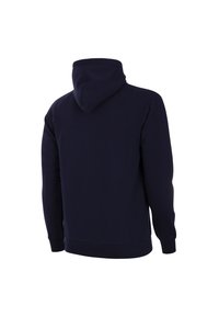 Marineblauwe hoodie met een ontspannen pasvorm, uitgerust met een trekkoord bij de capuchon, geribde manchetten en zoom. Gemaakt van een zachte, gestructureerde stof met een gladde afwerking.