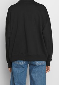 Monki Felpa - black