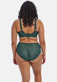 Donkergroene beha en hoog-gesneden slipset met een textuurstof, verstelbare bandjes en haak-en-oogsluiting. Achteraanzicht weergegeven.