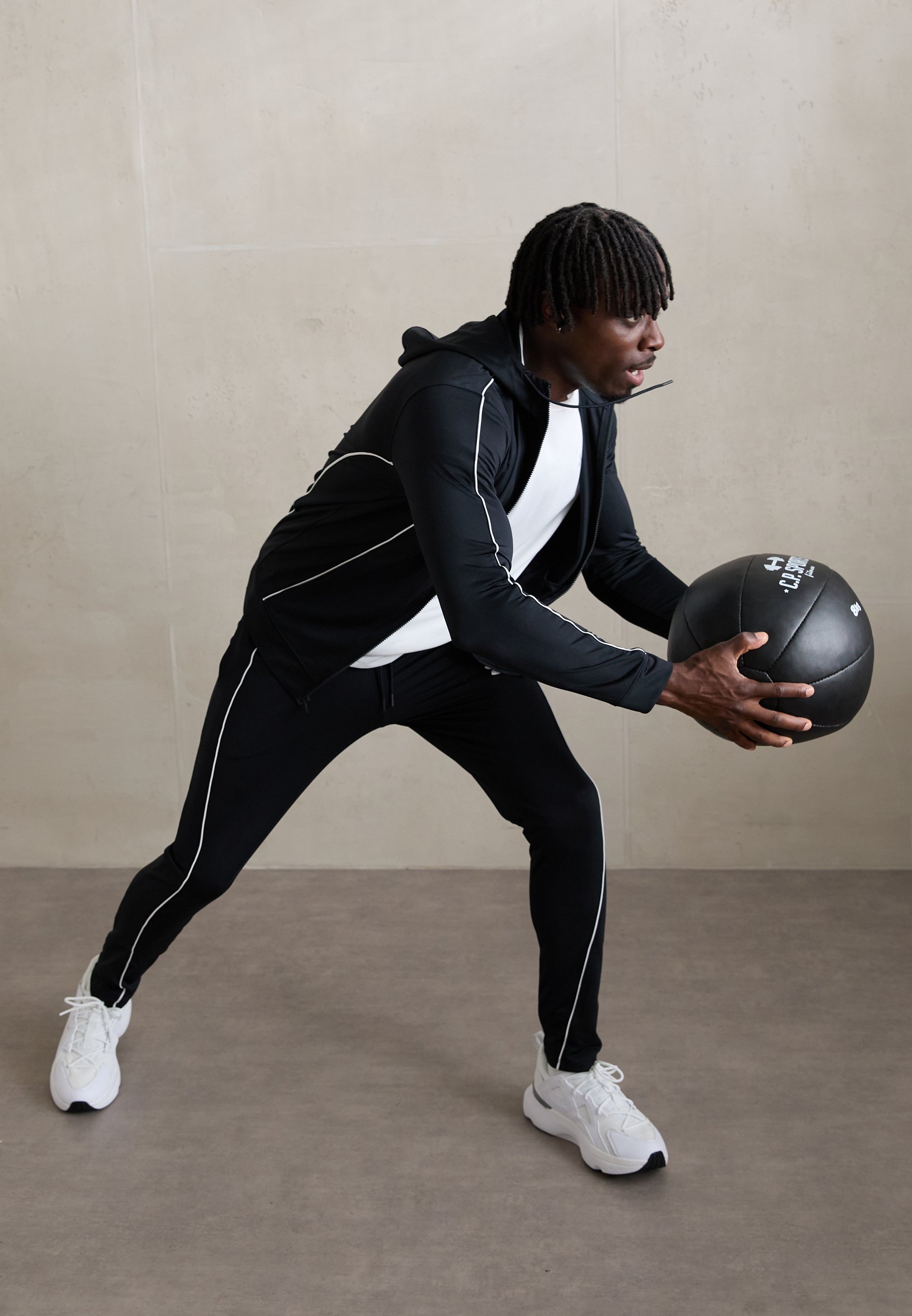 Under Armour TRACKSUIT - Tracksuit - black/white/black - Zalando