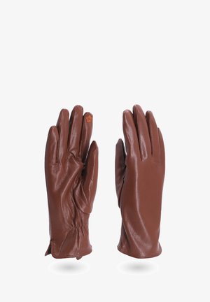 Guanti in pelle marrone con una texture liscia, design aderente e dettaglio arricciato al polso. Un piccolo accento floreale è visibile su un dito.