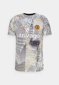 Chelsea FC Nike jersey featuring a black, white, and beige abstract pattern, short sleeves, and a round neckline with a club crest and sponsor logo.