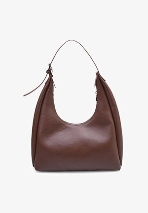 Brown leather hobo bag with a curved shape, shoulder strap, and smooth texture. Features a zip closure on one side.