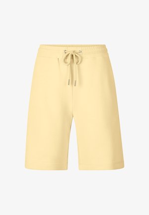 Żółte bawełniane szorty z elastycznym pasem, regulowanym sznurkiem i luźnym krojem. Prosty design bez widocznych wzorów czy dodatków.