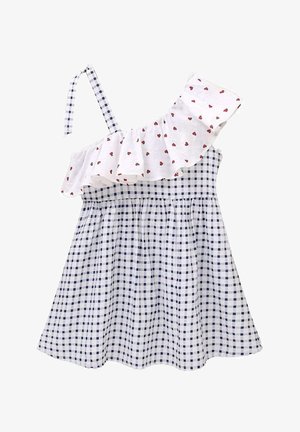 Biała i granatowa sukienka w kratę z jednym ramiączkiem, falbaną przy dekolcie oraz czerwonymi wzorami serc na falbanie. Zebrana spódnica.